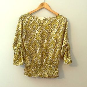 I am selling a Michael Kors t - shirt